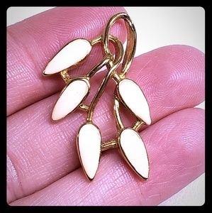 Cream and gold tone enamel pendant